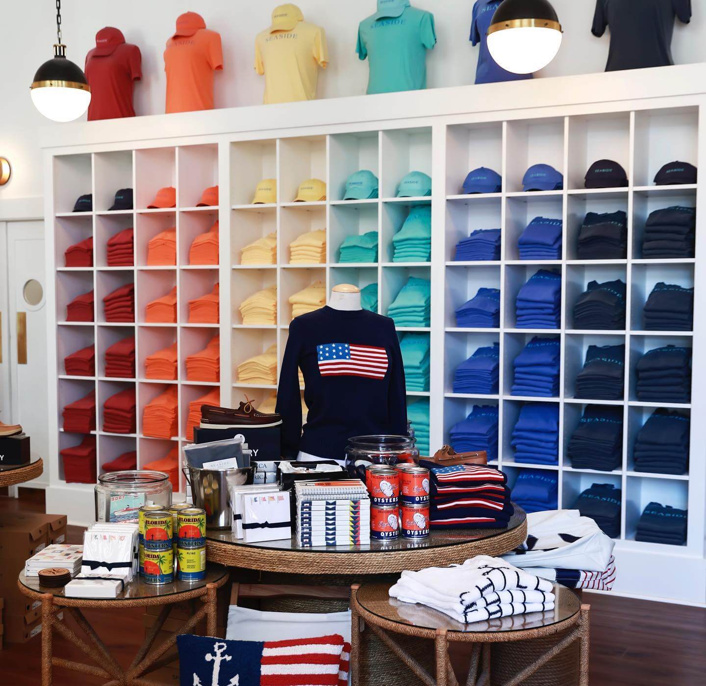 A colorful display of polo shirts in a store.