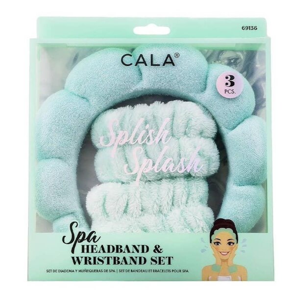 Aqua-colored spa headband and wristband set in packaging, labeled "CALA" and "Splish Splash." 