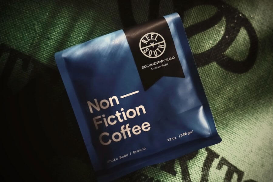 A 12 oz bag of Non-Fiction Coffee, whole bean/ground, labeled "Documentary Blend" by Reel South