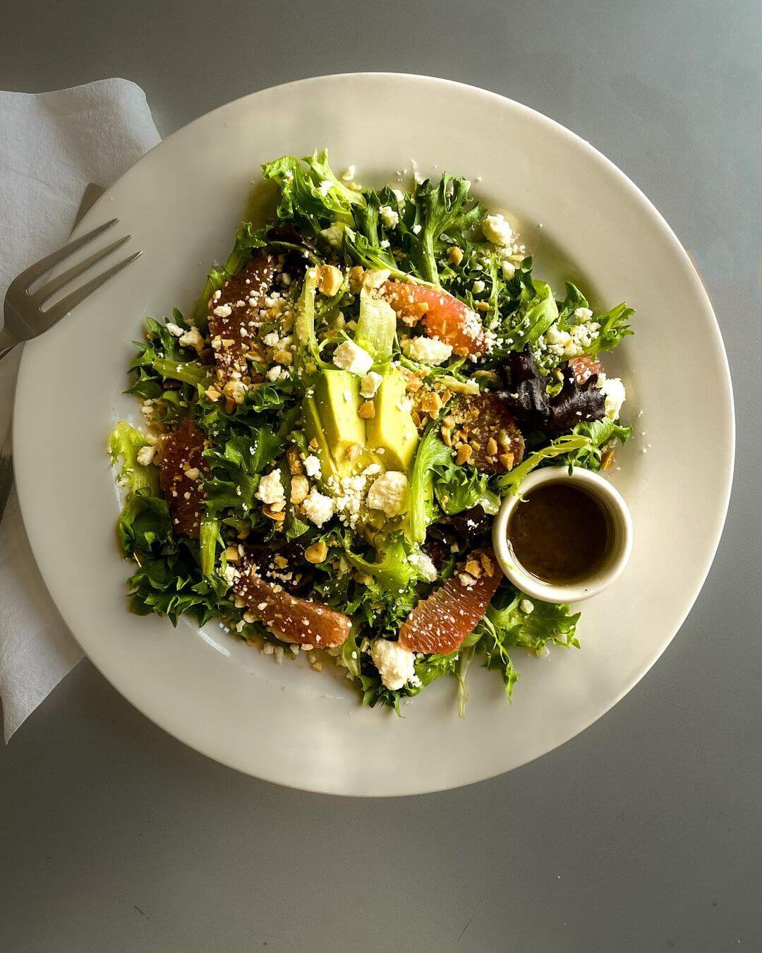 salad on a round white plate