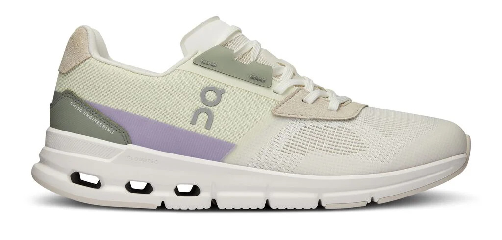 Sneakers with a lavender accent and a perforated sole design.