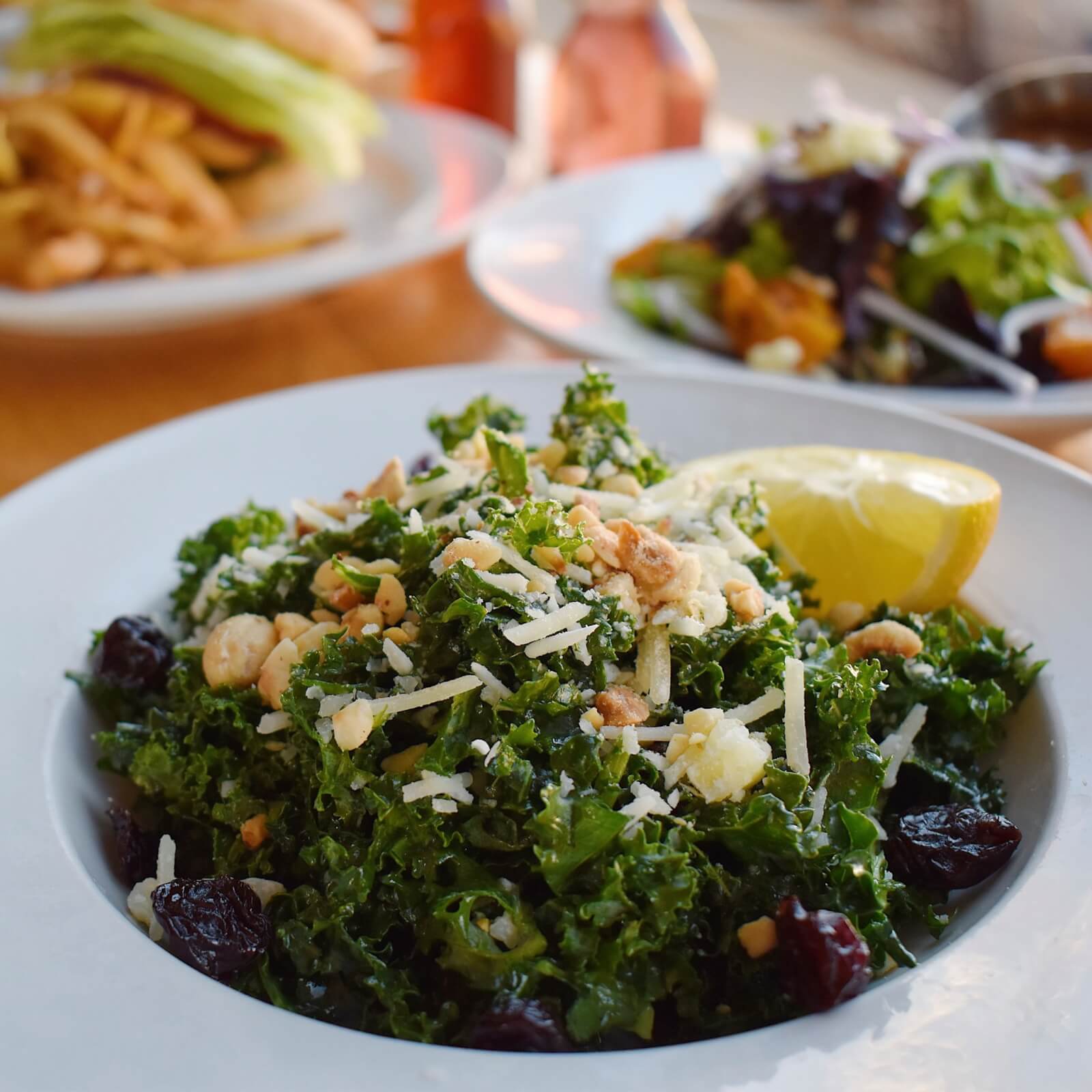 chopped kale salad with lemon slice