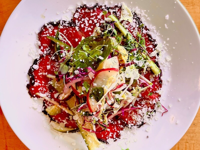 Salad with greens and grated parmesan