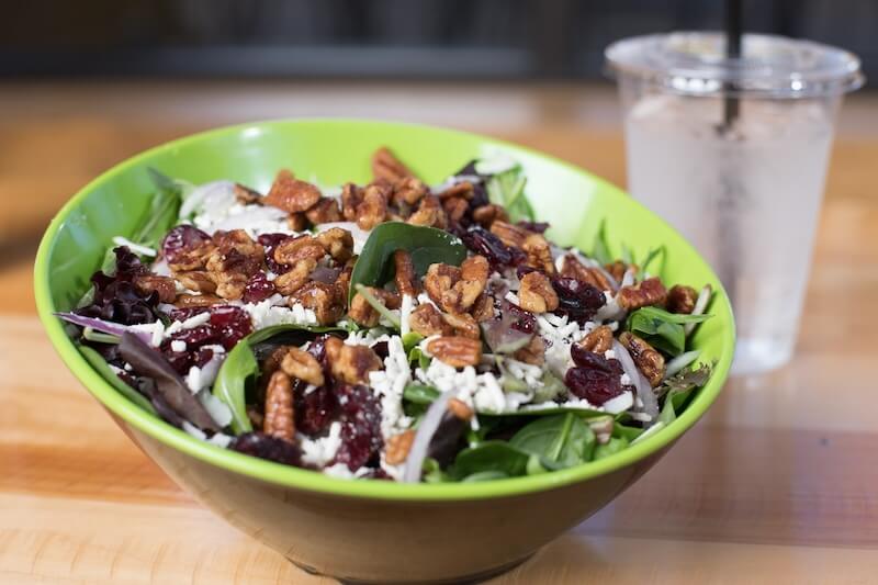 Salad filled with pecans and cranberries 