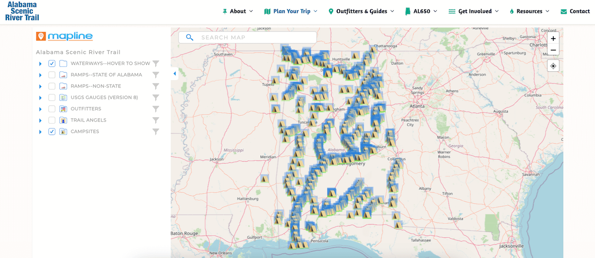 Map showing the Alabama Scenic River Trail with marked locations for waterways, ramps, gauges, and campsites across Alabama and surrounding areas, highlighting some of the best towns to visit in Alabama along the route.