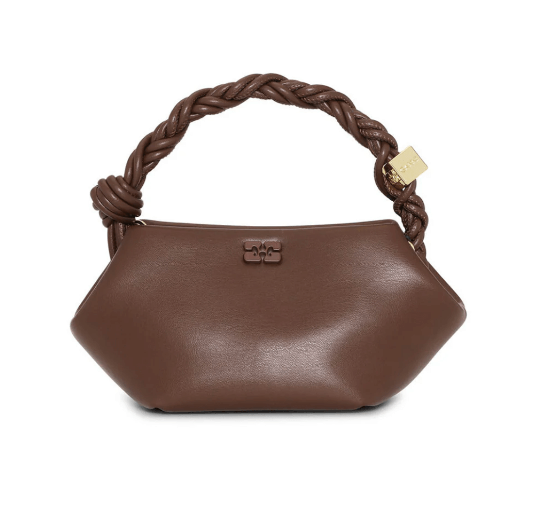 Exquisite brown leather handbag, featuring a twisted handle and a chic gold lock detail.