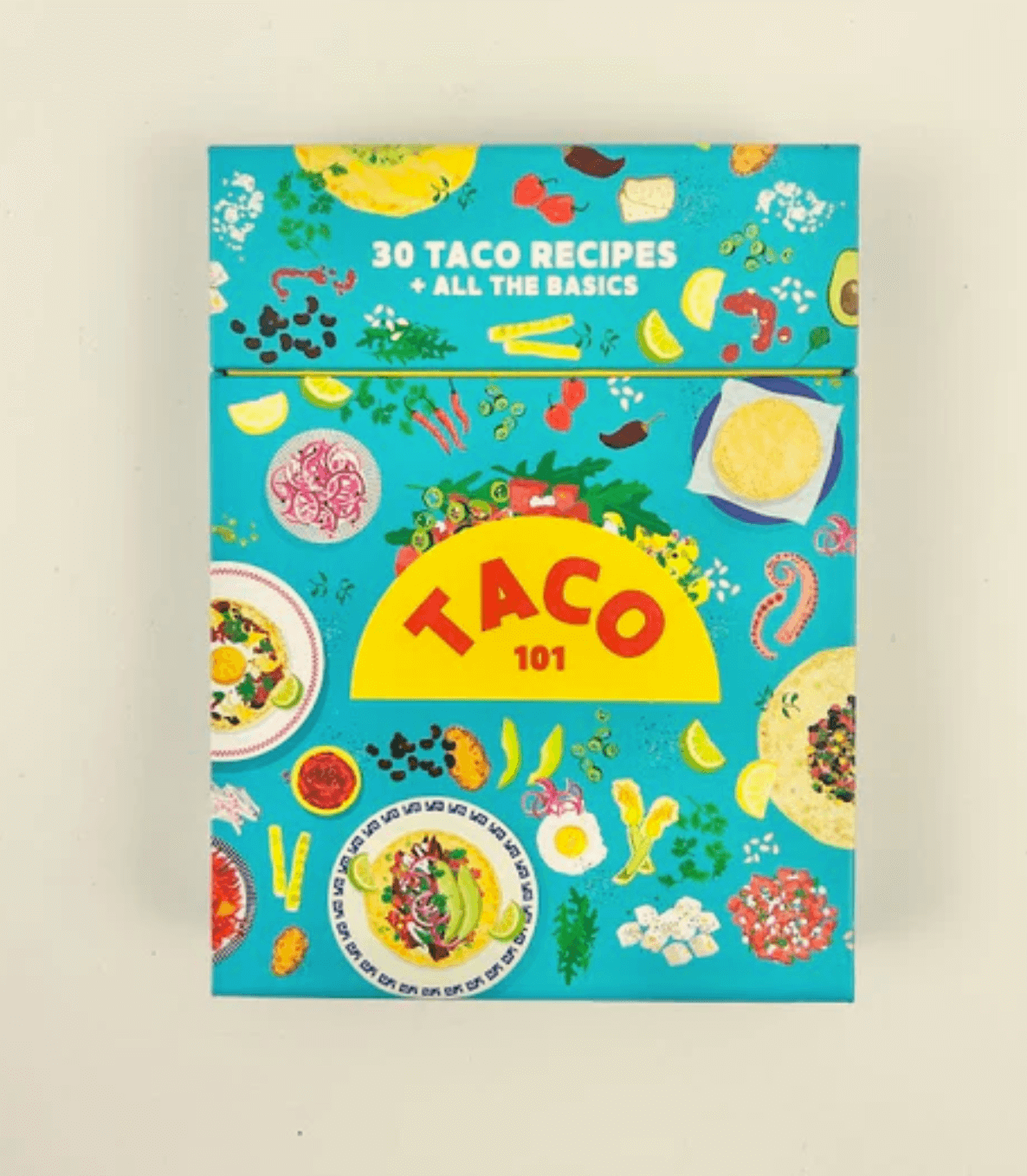 A colorful box titled "Taco 101" features various taco ingredients, promising "30 Taco Recipes + All the Basics." 