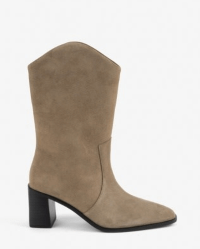 A single tan suede cowboy boot with a high block heel.